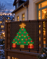 Pixel Christmas tree lit on the LED mesh
